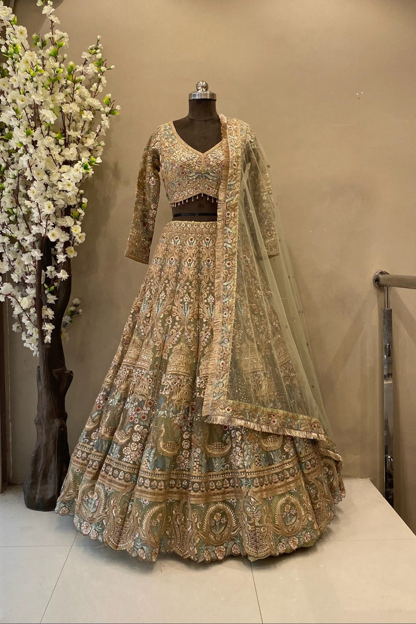 designer lehenga in pista green colour