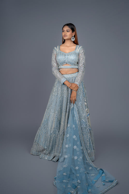 Front view of designer royal blue embroidered lehenga for sangeet by Urban Dulhaniya.