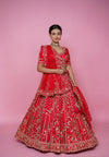Full 5 meter flair of classic red silk wedding lehenga by Urban Dulhaniya