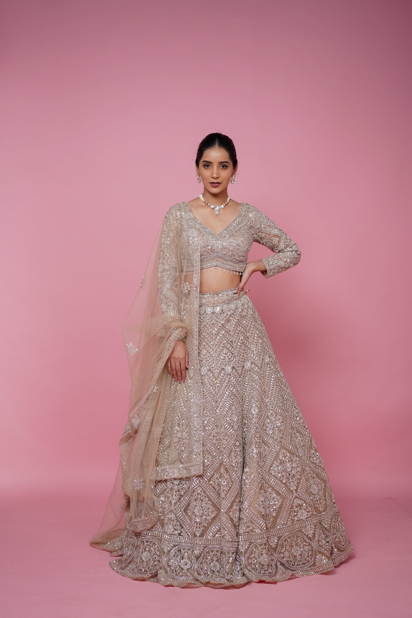 beige gold lehenga best suited for engagement and recpetion function
