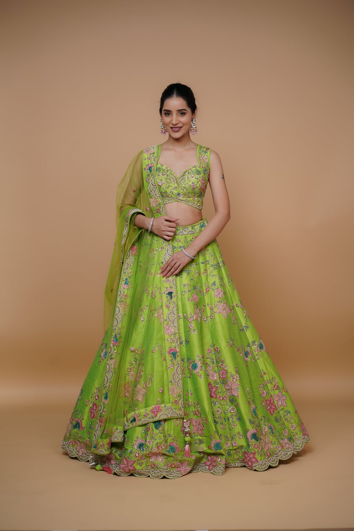 sangeet lehenga design in fluroscent green colour