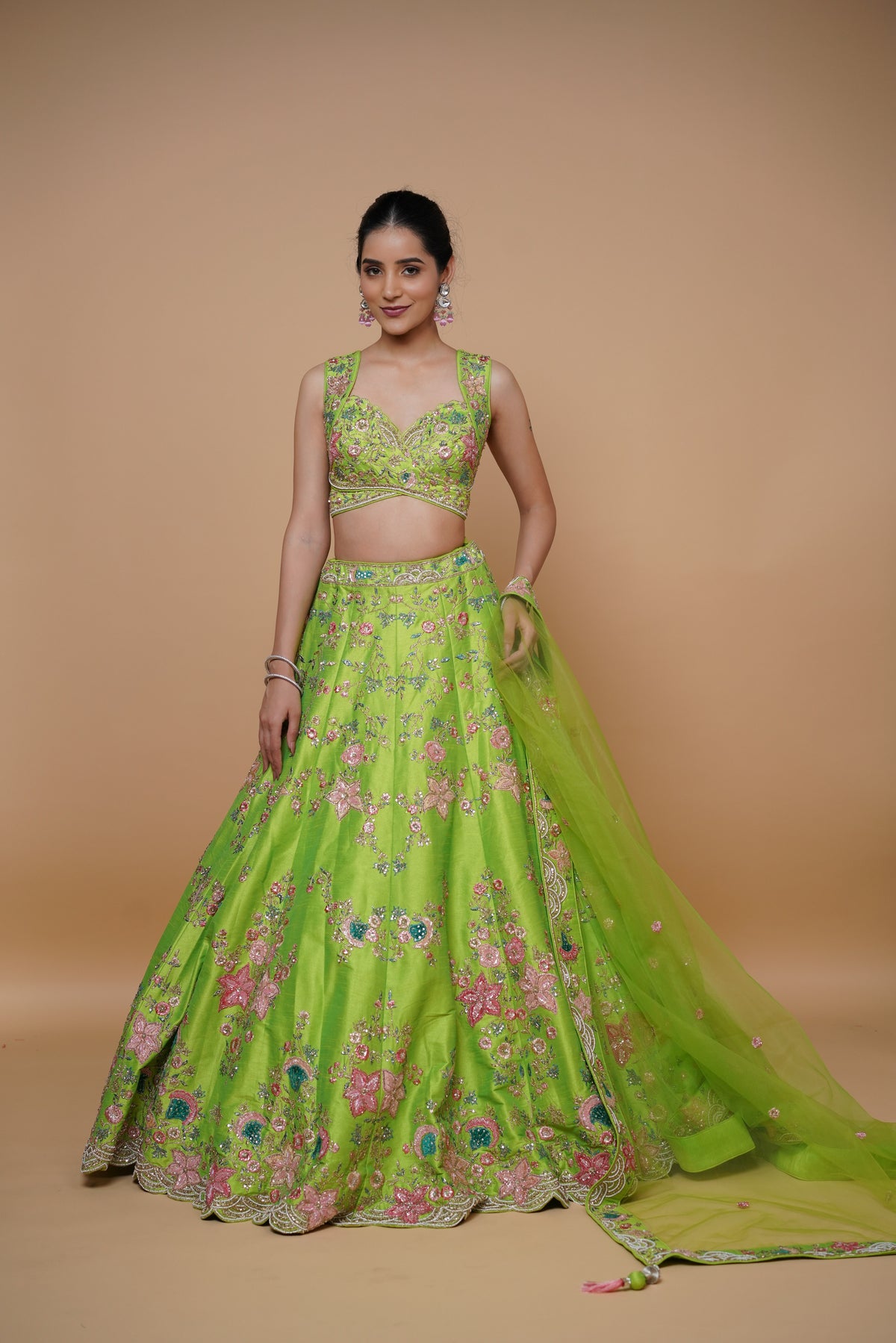 sangeet lehenga design in fluroscent green colour