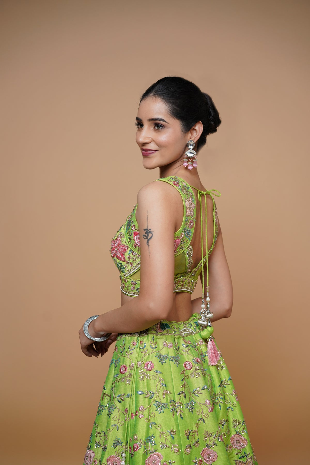 sangeet lehenga design in fluroscent green colour