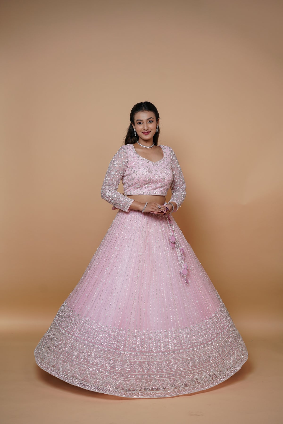 hand work pink lenega with elegant design best suited for reception.