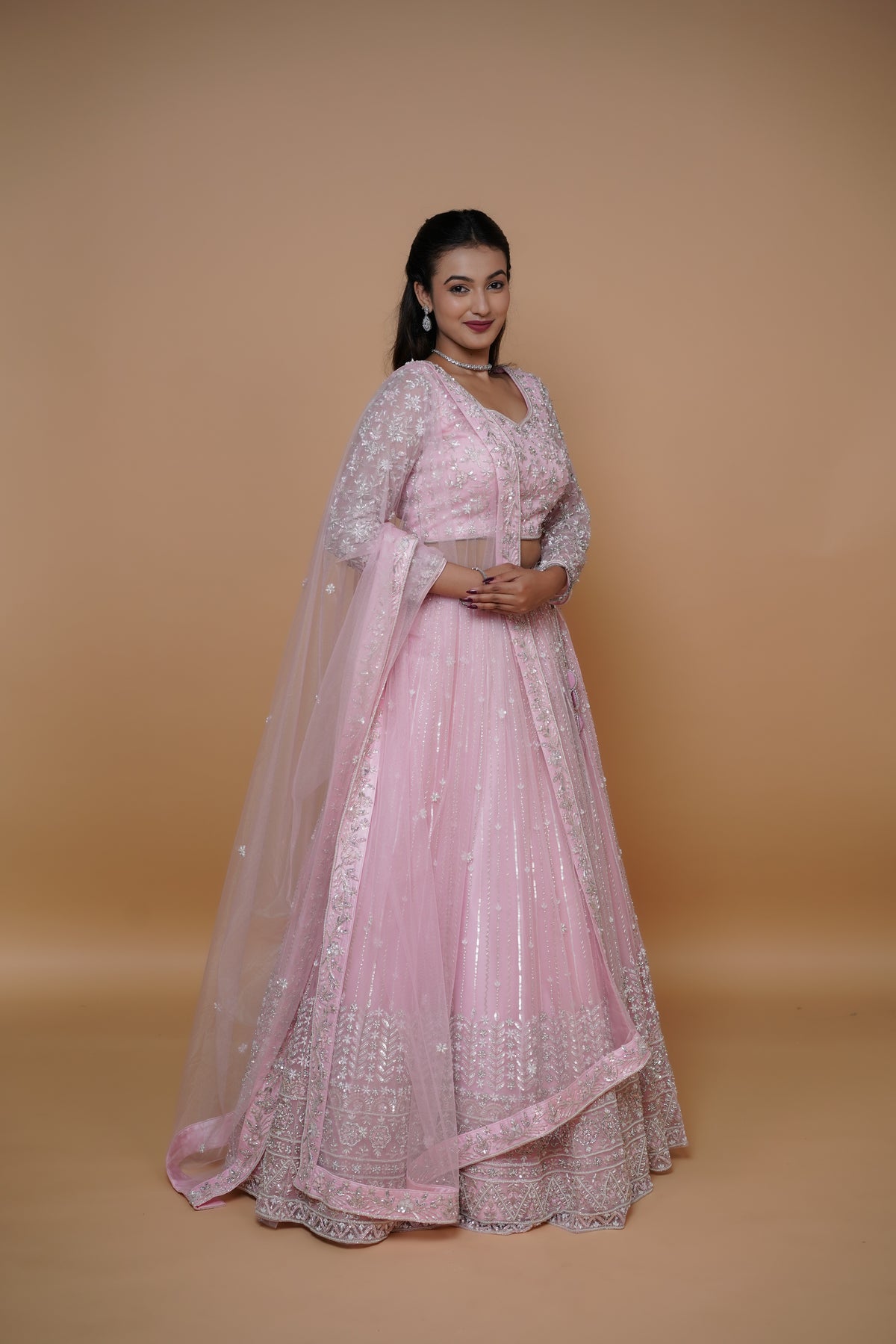 hand work pink lenega with elegant design best suited for reception.