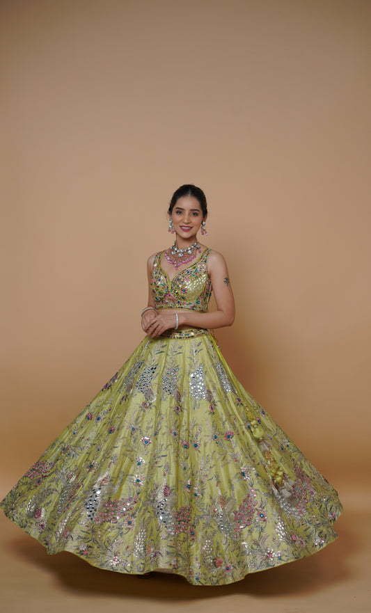 Woman wearing a luxurious premium silk designer lehenga for a wedding
