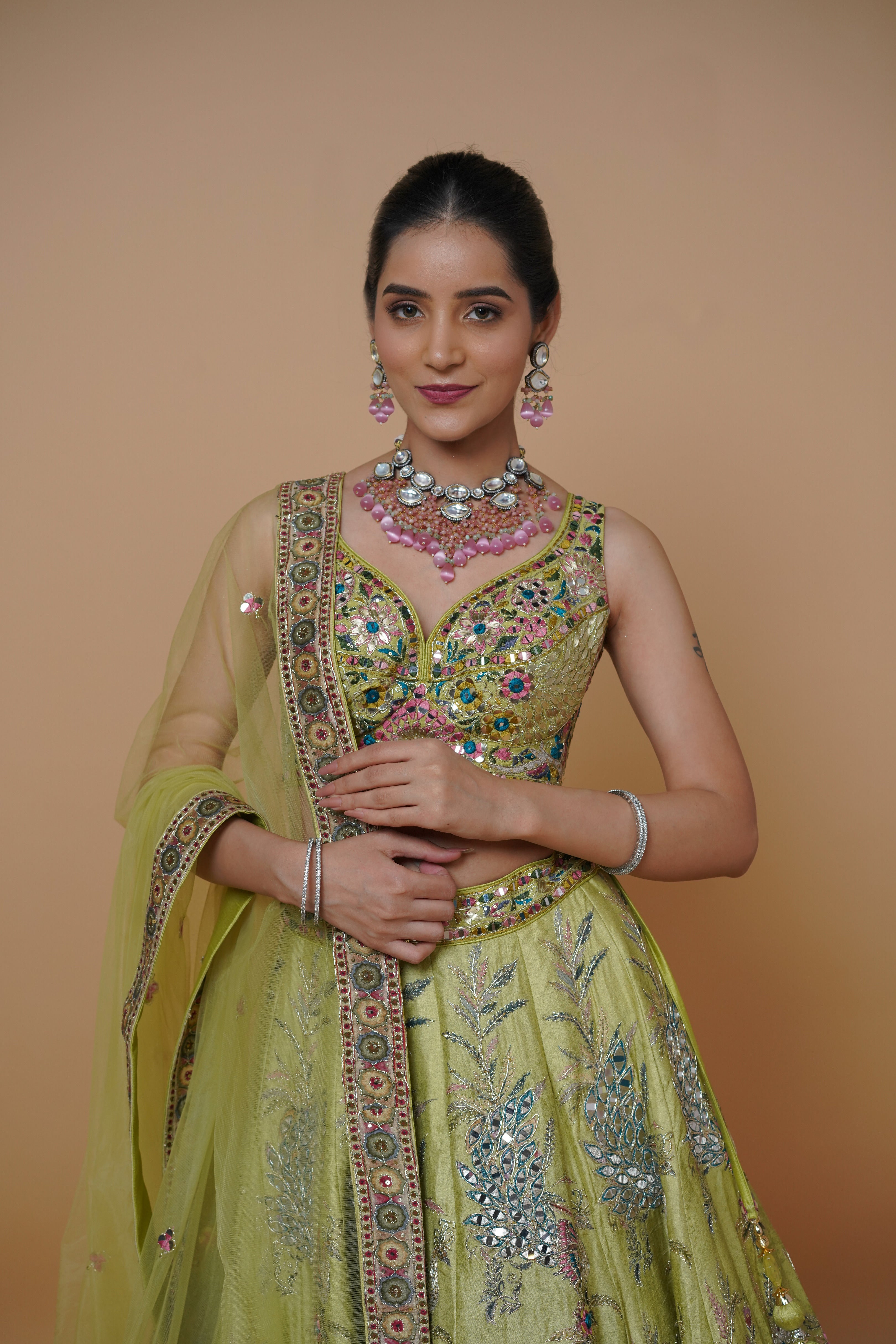 carnival theme designer green lehenga with heavy fabric and print.