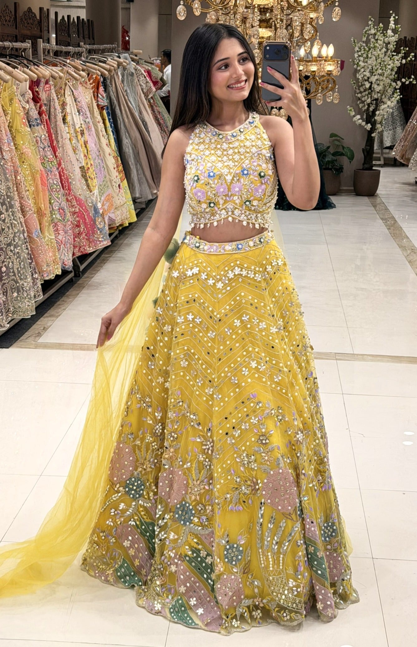Full length mustard yellow lehenga set with multicolour floral hem and net dupatta – Urban Dulhaniya