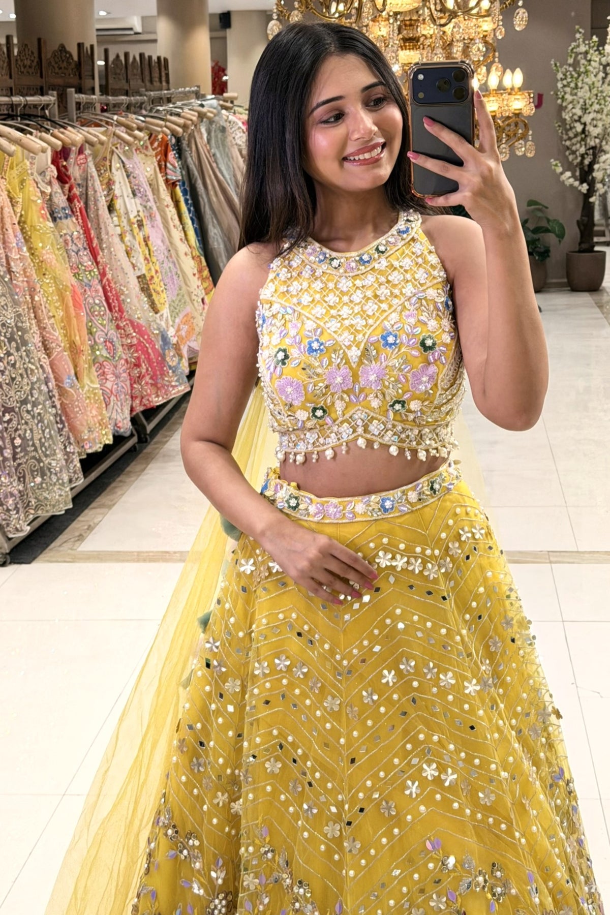 Mustard yellow halter lehenga blouse with 3D floral embroidery and pearl tassels – Urban Dulhaniya Pune