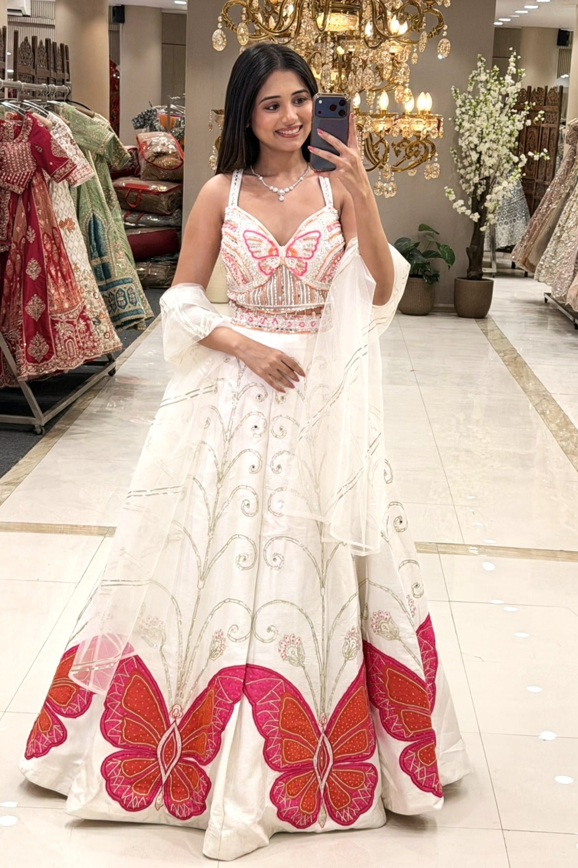 White butterfly appliqué lehenga set with organza dupatta and flared skirt — Haldi Mehendi wear at Urban Dulhaniya Pune
