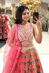 Full flared Patola print multicolour lehenga set with sequin embroidered choli and coral-pink net dupatta — Sangeet wear Urban Dulhaniya