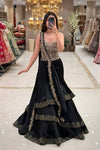 Black lehenga for reception or sangeet in Pune – gold zardozi tiered set at Urban Dulhaniya MG Road