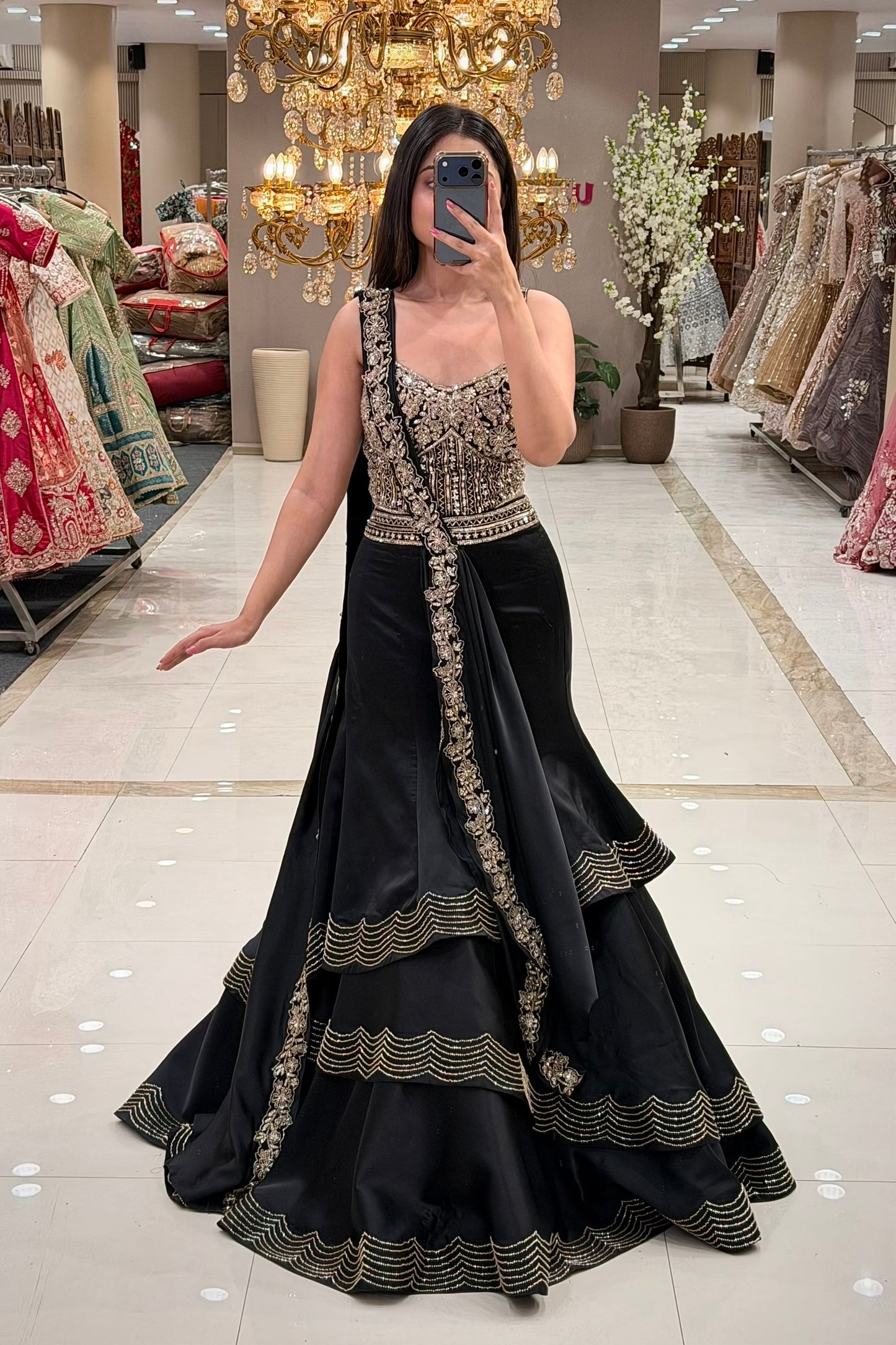 Black lehenga for reception or sangeet in Pune – gold zardozi tiered set at Urban Dulhaniya MG Road