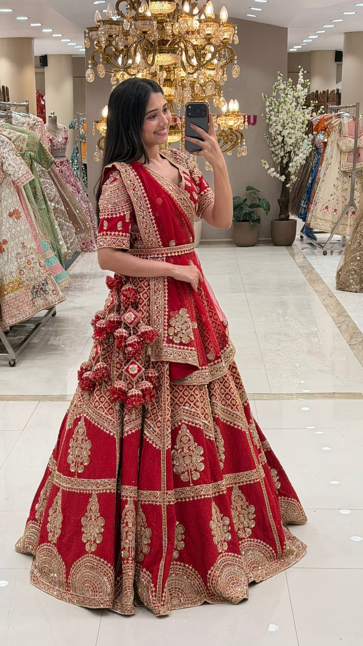 Red bridal lehenga shop Pune MG Road Camp – traditional gold zardozi set at Urban Dulhaniya Oswal Plaza