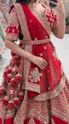 Luxury red bridal lehenga Pune – gold zardozi tiered skirt and wrap blouse at Urban Dulhaniya boutique.
Red bridal lehenga shop Pune MG Road Camp – traditional gold zardozi set at Urban Dulhaniya Oswal Plaza
