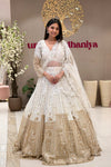 White gold bridal lehenga with panel skirt and 3D floral blouse at Urban Dulhaniya MG Road Pune.
Modern white bridal lehenga India – geometric gold gradient skirt at Urban Dulhaniya Camp Pune