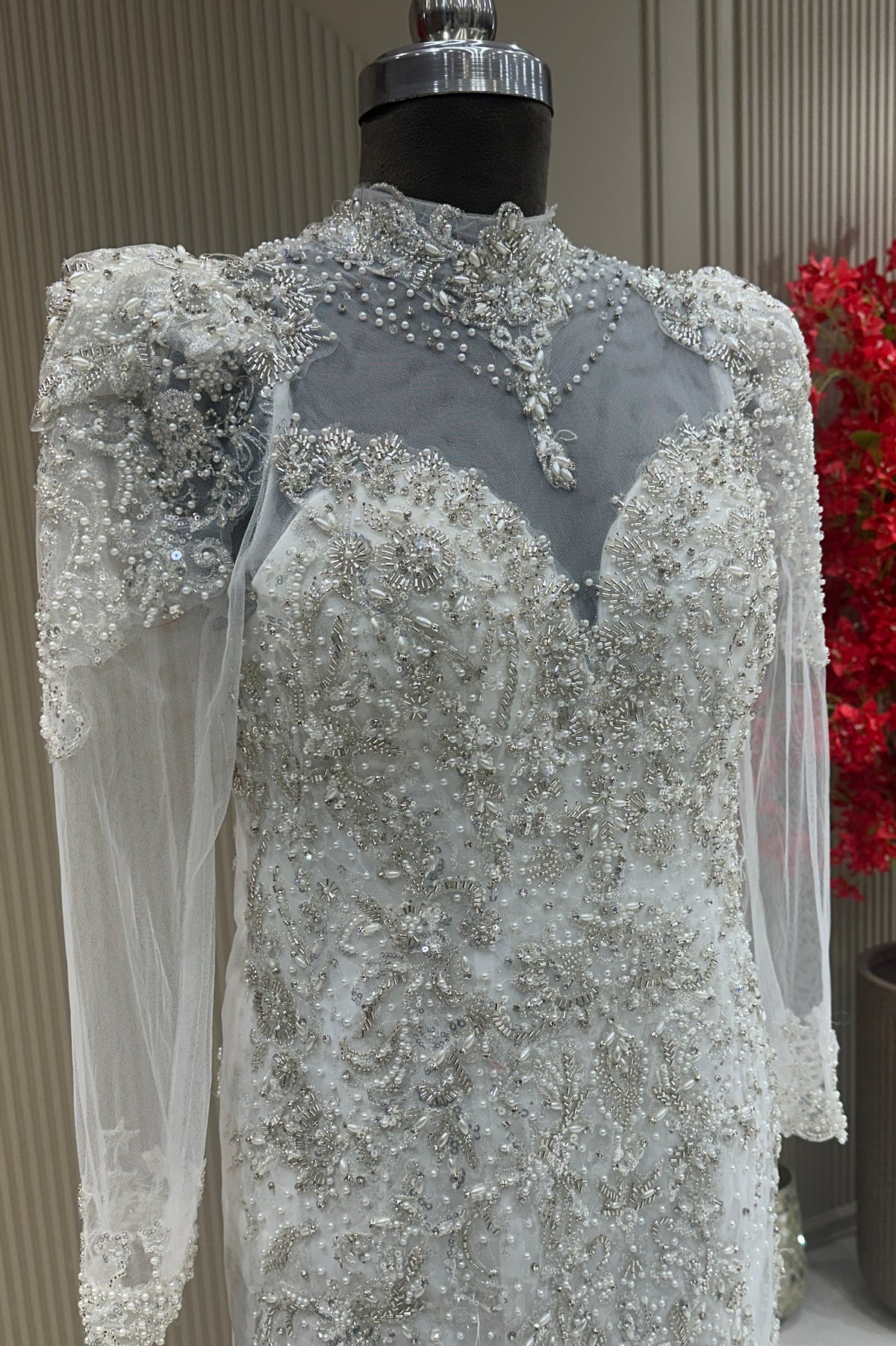 Angled view off white net sweetheart neck gown bridal & occasion saree from Urban Dulhaniya Pune