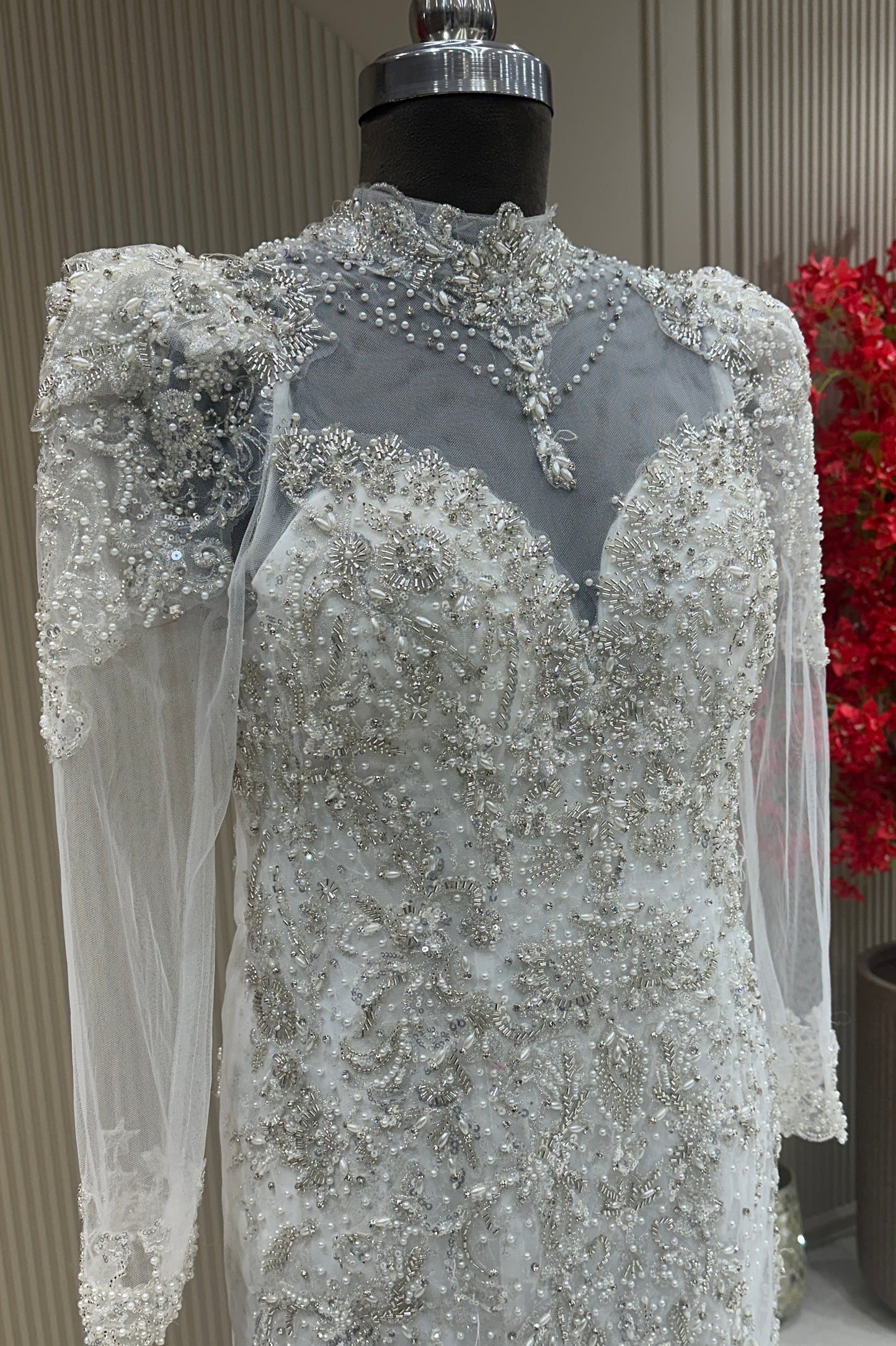 Angled view off white net sweetheart neck gown bridal & occasion saree from Urban Dulhaniya Pune
