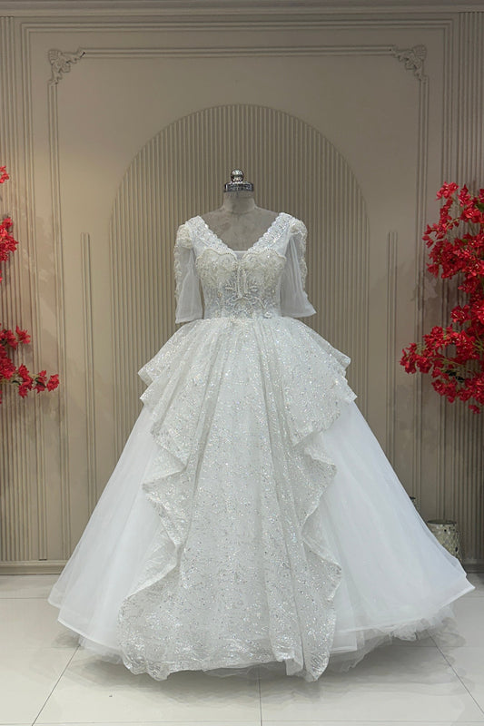 Full front view off white net pearl sequence gown with ballgown skirt designer bridal wear at Urban Dulhaniya Pune