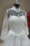 Angled bust detail off white net high collar lace dress designer bridal wear at Urban Dulhaniya Pune