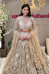 Champagne couture bridal lehenga with pearl cage blouse and embroidered skirt at Urban Dulhaniya MG Road Pune