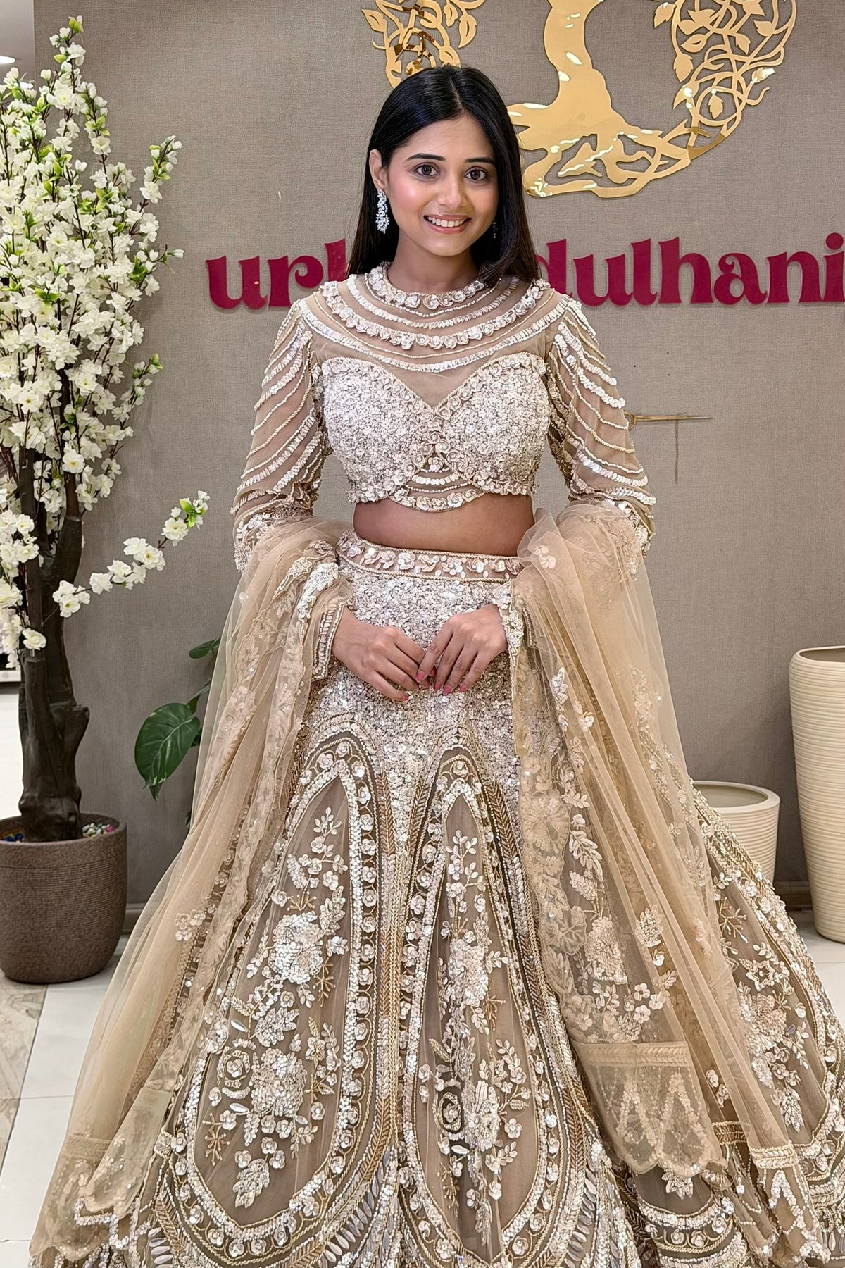 Champagne couture bridal lehenga with pearl cage blouse and embroidered skirt at Urban Dulhaniya MG Road Pune