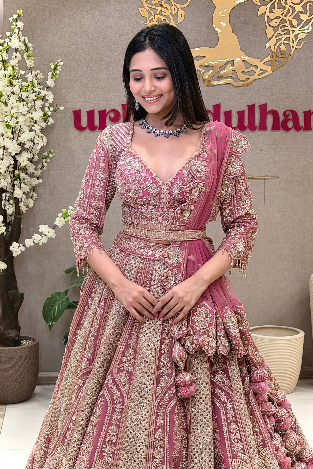 Rose Pink Bridal Lehenga with Zari Embroidery, Handwork Blouse, Pom Pom Dupatta and Gold Panel Skirt