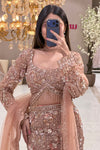 Peach rose gold bridal lehenga blouse with sequin handwork and crystal tassel hem, Urban Dulhaniya Pune