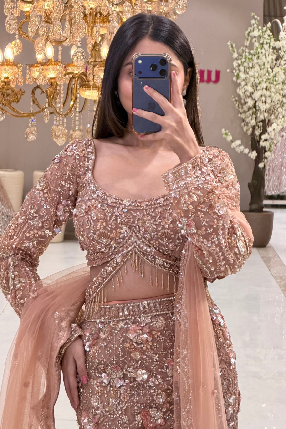 Peach rose gold bridal lehenga blouse with sequin handwork and crystal tassel hem, Urban Dulhaniya Pune