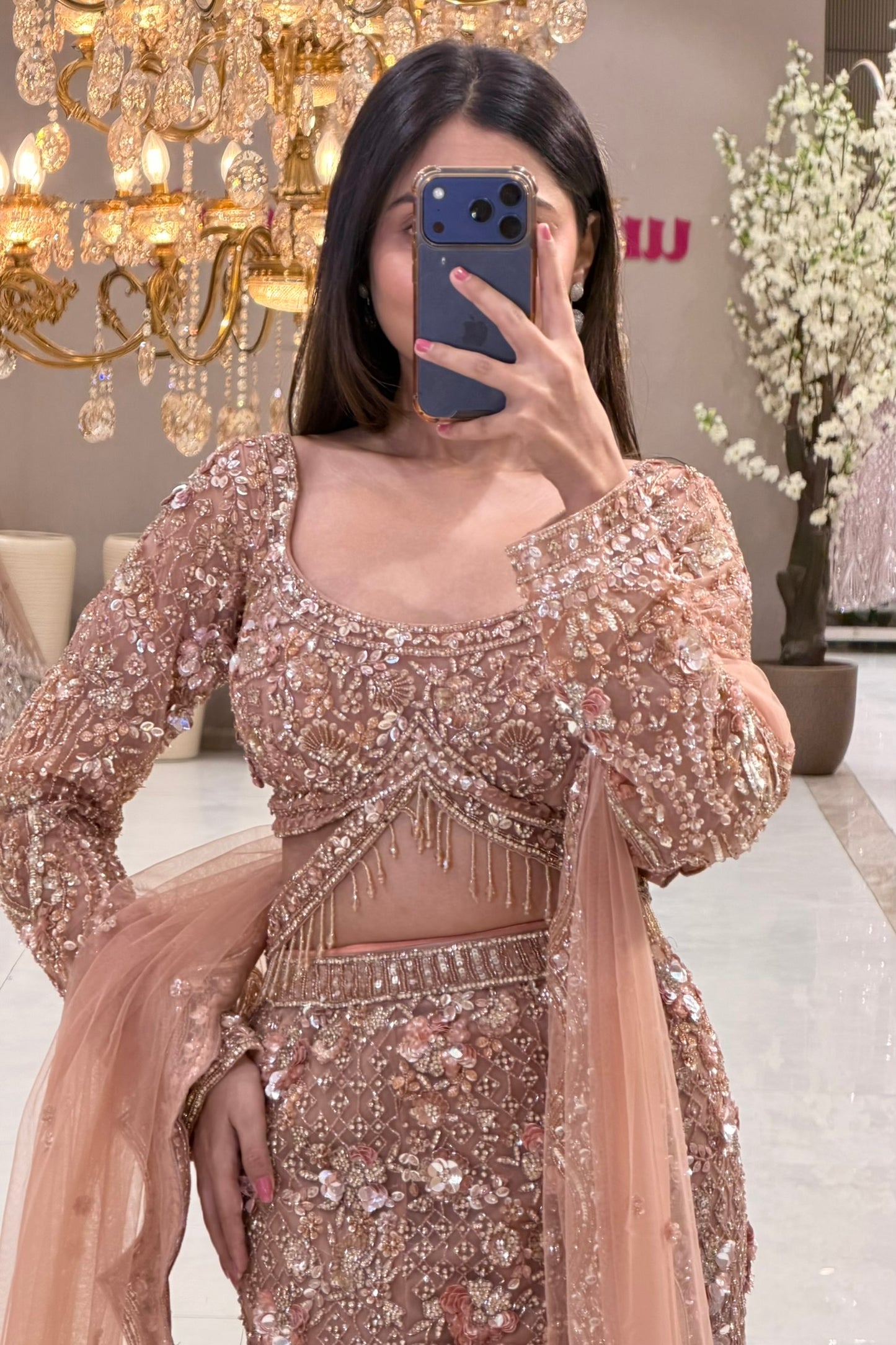 Peach rose gold bridal lehenga blouse with sequin handwork and crystal tassel hem, Urban Dulhaniya Pune