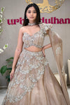 Nude champagne lehenga with one-shoulder choker blouse and white floral bead handwork – Urban Dulhaniya