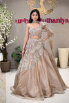 Best nude lehenga in Pune – one-shoulder choker blouse with pearl handwork at Urban Dulhaniya