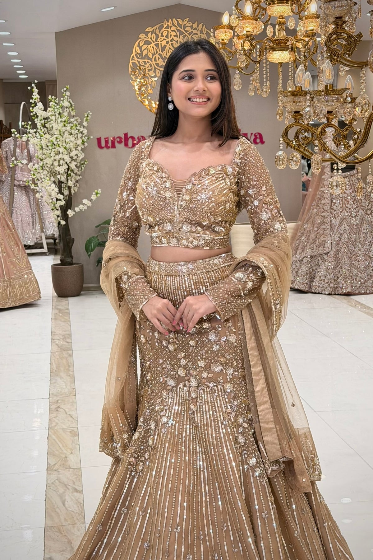Champagne gold mermaid lehenga set with net dupatta and flared hem – reception wear Urban Dulhaniya