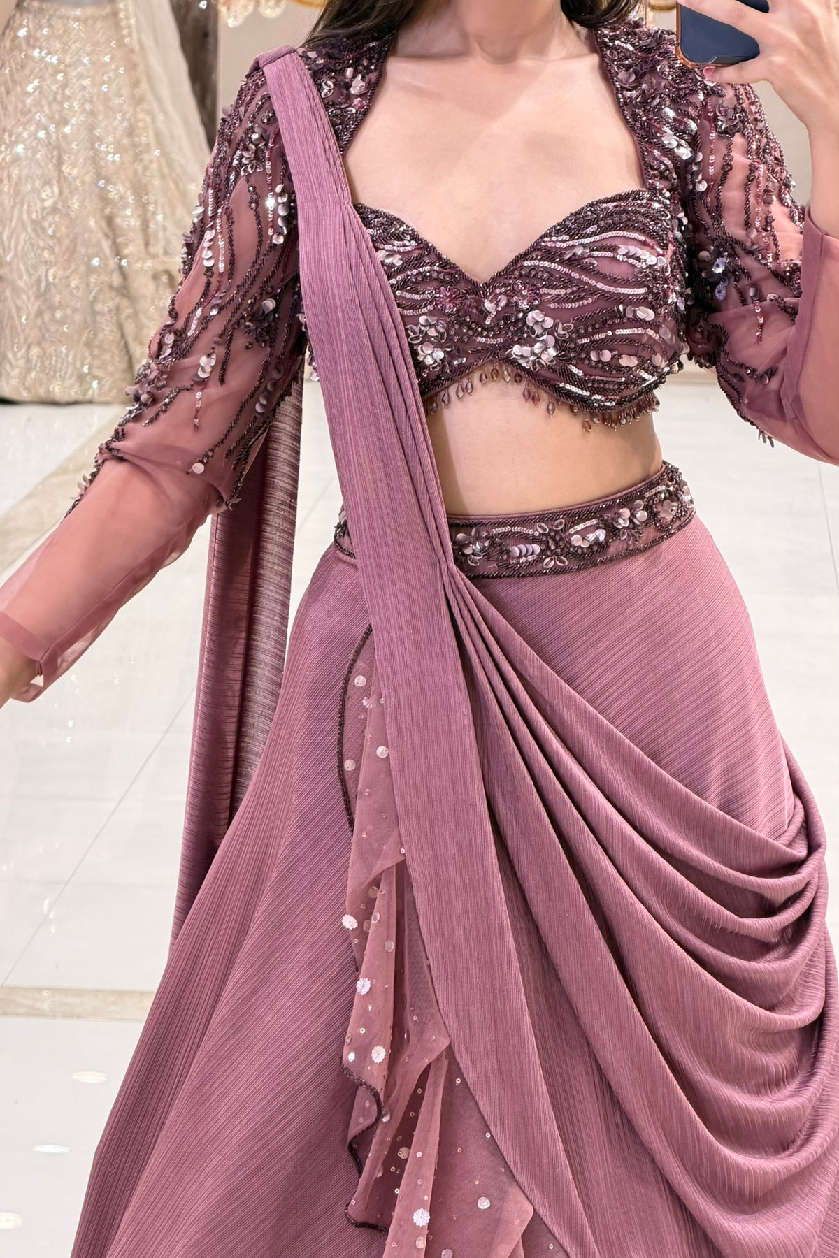 Dusty Rose Draped Lehenga with Sequin Sweetheart Blouse, Sheer Sleeves and Attached Dupatta