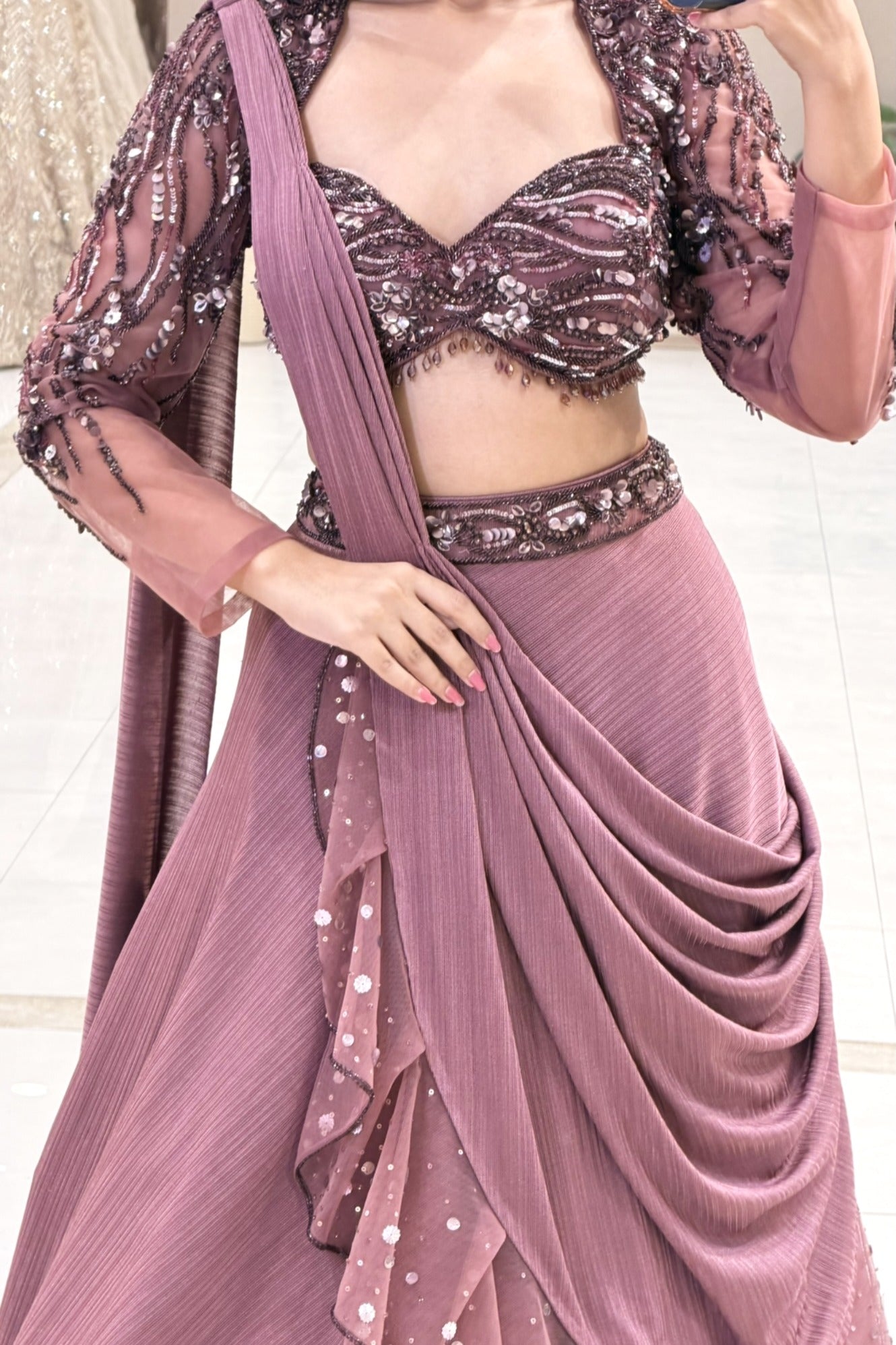 Sequin sweetheart blouse with wave embroidery and crystal tassels on draped lehenga – Urban Dulhaniya