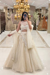 Full length ivory lehenga set with illusion neckline blouse and voluminous net skirt – Urban Dulhaniya