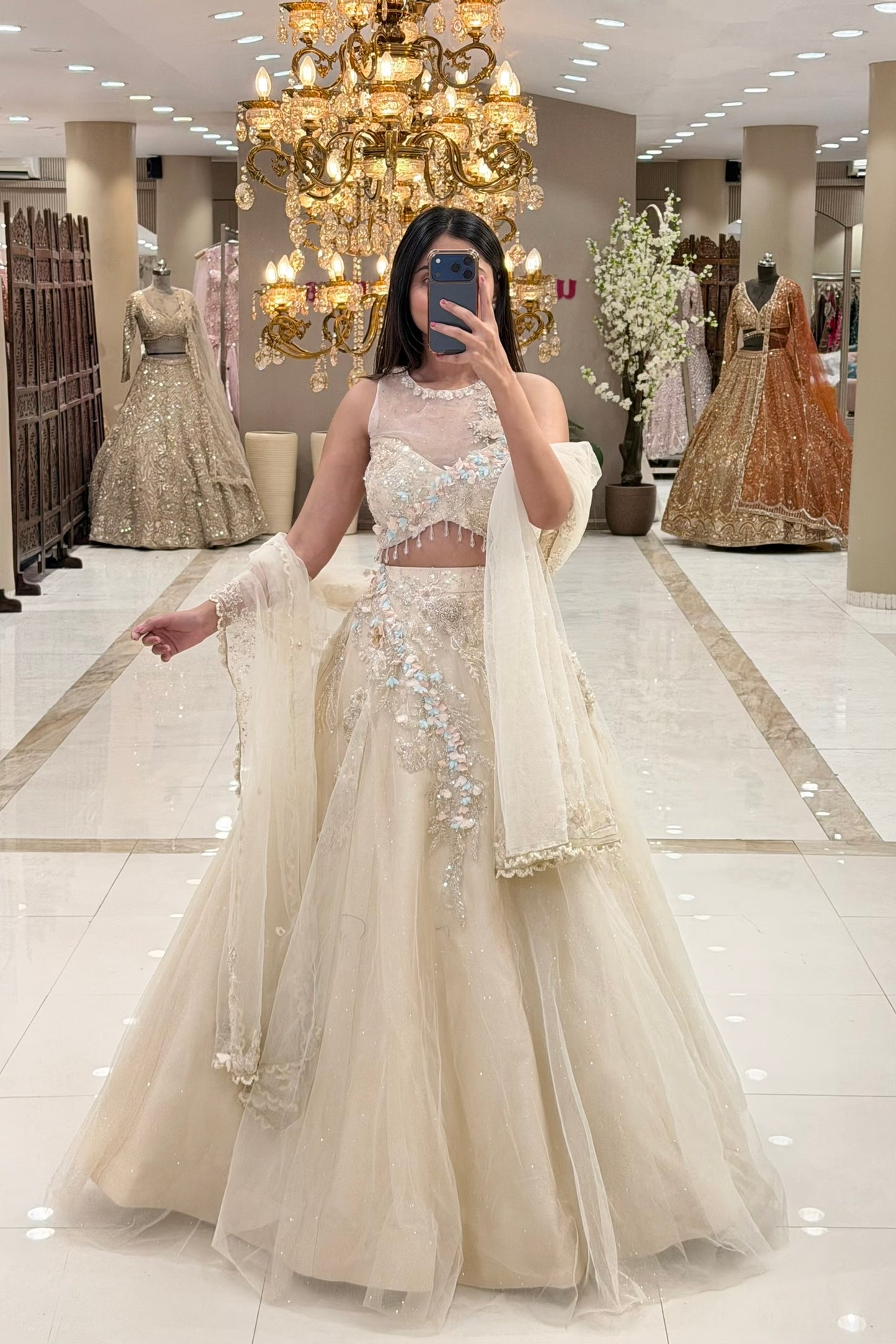 Full length ivory lehenga set with illusion neckline blouse and voluminous net skirt – Urban Dulhaniya