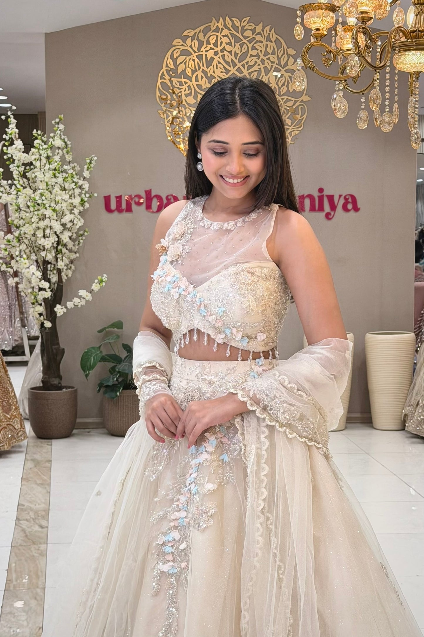 Ivory white bridal lehenga with 3D floral blouse, shimmer skirt and net dupatta – Urban Dulhaniya Pune
