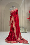 Full front view red satin silk saree with moti zardoshi cutdana work, designer bridal wear at Urban Dulhaniya Pune