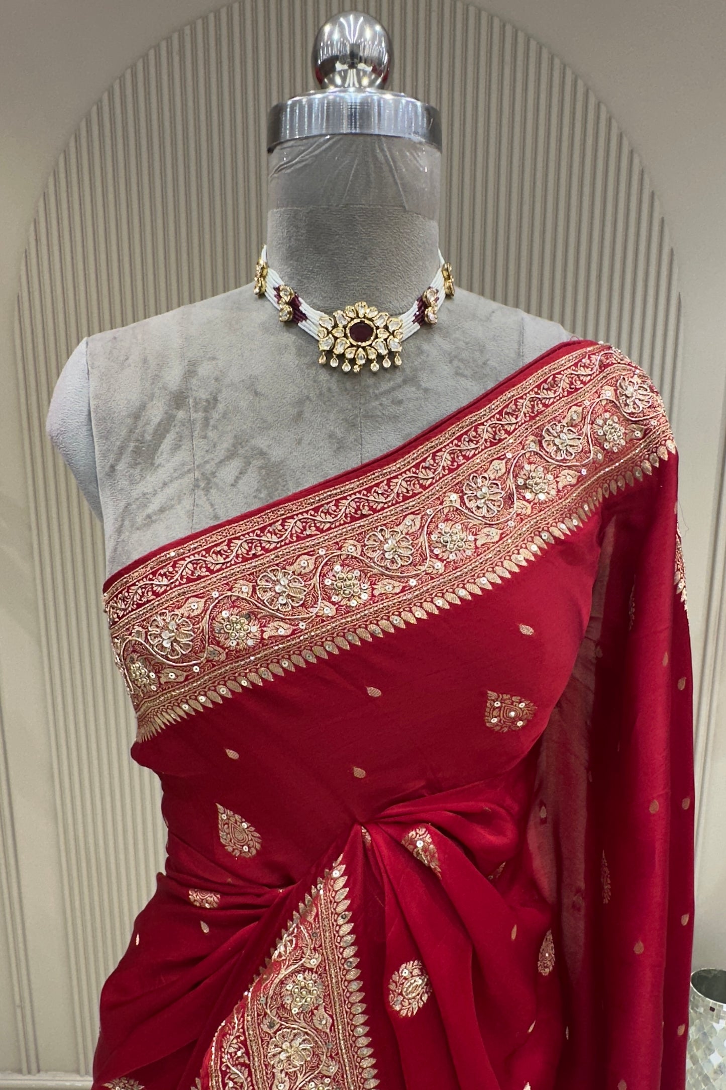 Close-up drape and border view deep red satin saree premium ethnic wear from Urban Dulhaniya