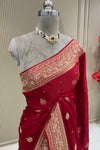Front detail drape view deep red satin saree with gold border designer bridal wear at Urban Dulhaniya Pune