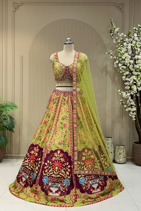 Pistachio green printed lehenga with mirror work blouse, full front view on mannequin with net dupatta