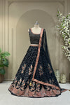 Black printed lehenga with sequin work, full front view on mannequin with net dupatta