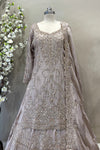 Intricate hand-embroidery and sequin work on designer champagne tissue silk bridal tunic.
