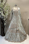 Designer sage green long kurta lehenga set with flared skirt and scalloped dupatta for brides.