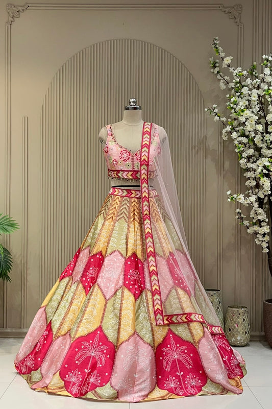 Pastel scallop printed lehenga, full front view on mannequin with sheer net dupatta