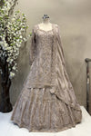 Flared designer lehenga skirt with vertical embroidery for a tall, regal bridal silhouette.