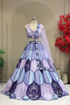 Lavender periwinkle scallop printed lehenga, full front view on mannequin with sheer net dupatta