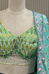 Close-up of sequin lattice hand-work blouse and printed dupatta border detail