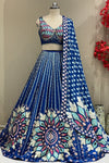 Royal blue lehenga set showing sunburst medallion hem and sequin border dupatta
